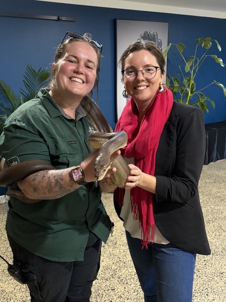 Kylie meeting a zookeeper and a snake at Byron Bay Wildlife Centre