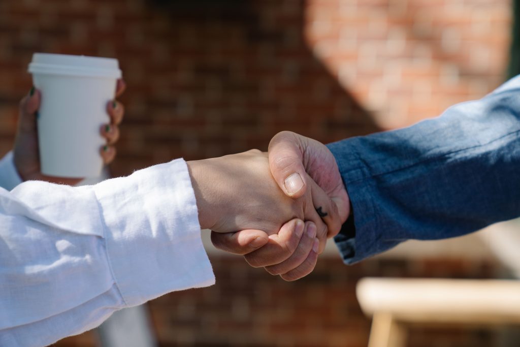 Two people shaking hands